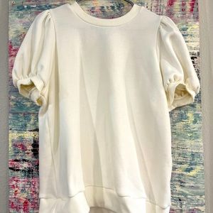 Cream colored short sleeve sweater